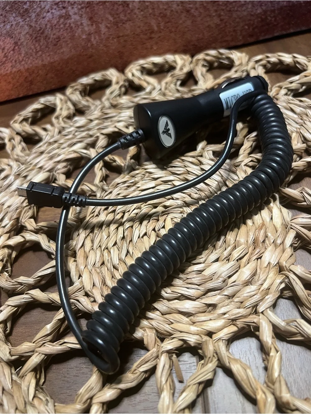 Compact Black Coiled Car Charger Cable with USB Connector